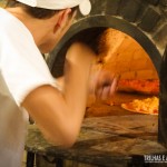 Pizzas preparadas no forno a lenha ficam ainda mais saborosas